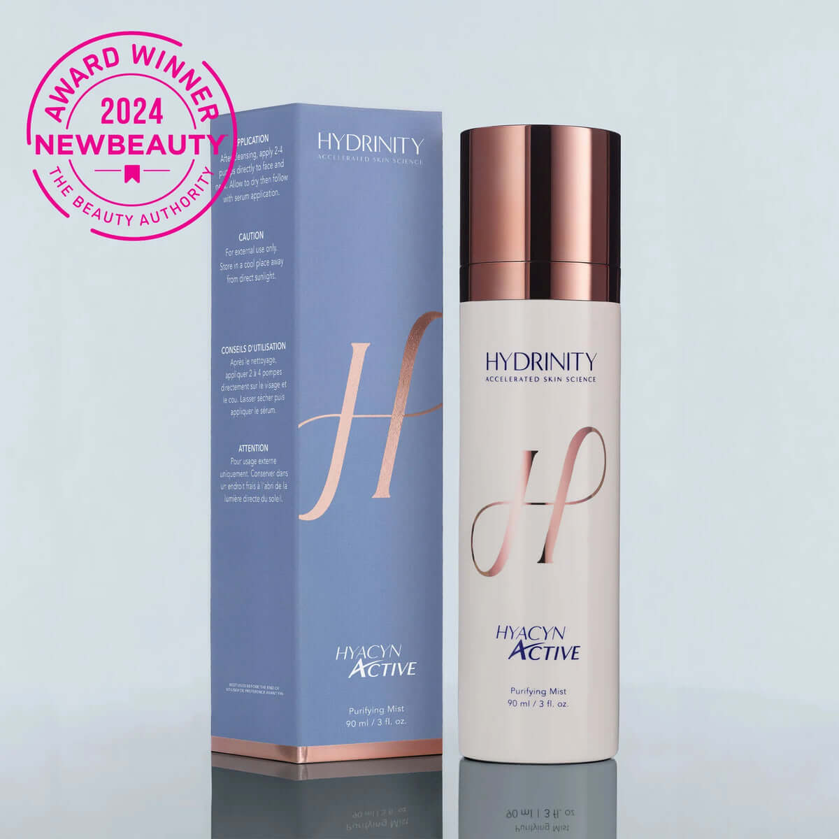 Hydrinity Hyacyn Active soothing mist in an elegant bottle with purple and rose gold packaging.
