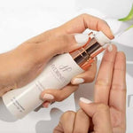 Hydrinity Renewing HA Serum being applied to fingers for hydration and skin barrier support.