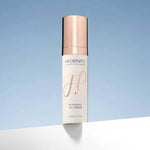 Hydrinity Renewing HA Serum bottle against a blue background, ideal for replenishing hydration and smoothing skin texture.