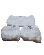 Plush headband and wrist cuff skincare set for a luxurious wash headband experience.