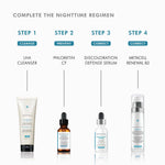 Complete nighttime regimen featuring SkinCeuticals Discoloration Defense serum and other essential products.