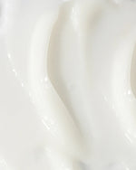 Close-up of the creamy texture of Vivier Acne Treatment Lotion for targeted acne treatment.