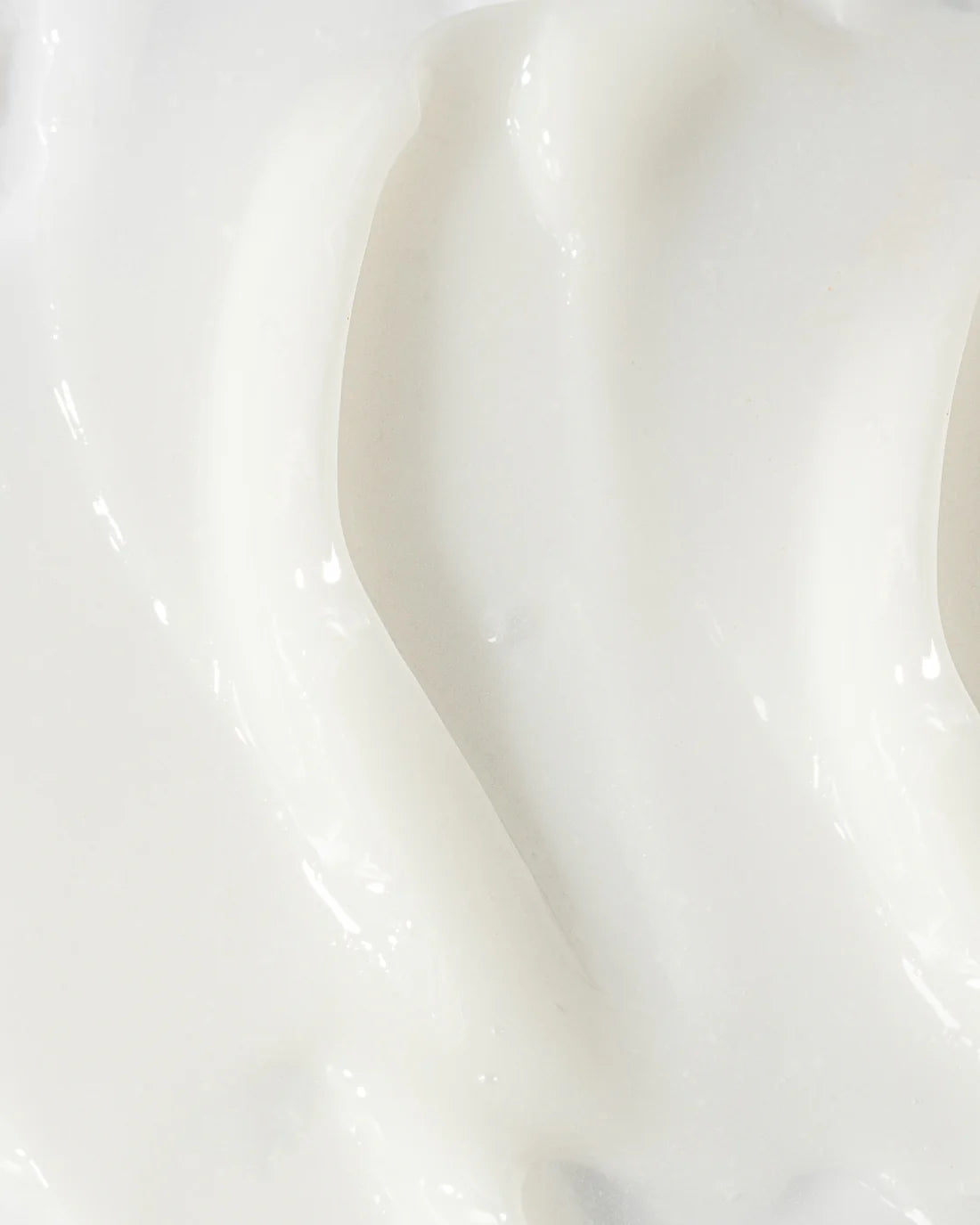 Close-up of the creamy texture of Vivier Acne Treatment Lotion for targeted acne treatment.