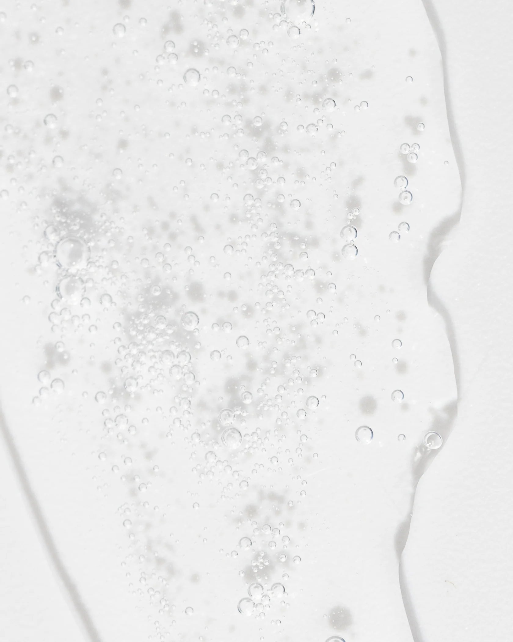 Close-up of Vivier Refreshing Toner showing its hydrating and refreshing formula with tiny bubbles.