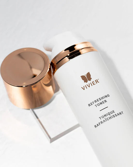 Vivier Refreshing Toner bottle with elegant design and rose gold cap on a white background.