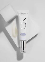 ZO 10 Vitamin C Self-Activating serum tube with creamy texture on a white surface.