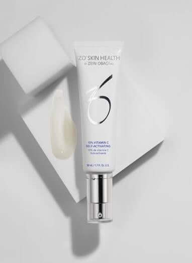 ZO 10 Vitamin C Self-Activating serum tube with creamy texture on a white surface.