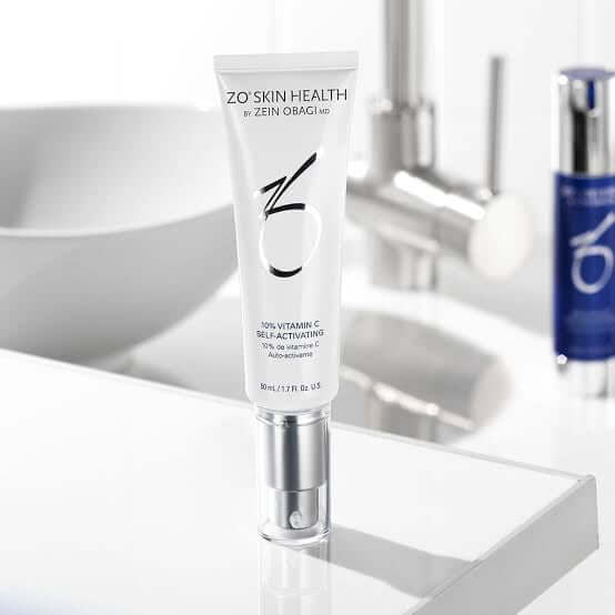 ZO 10 Vitamin C Self-Activating serum in a sleek tube on a bathroom counter