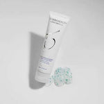ZO Exfoliating Cleanser tube with exfoliating beads on a white background, designed to refresh and unclog pores.