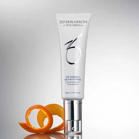 ZO 10 Vitamin C Self-Activating serum in a sleek tube with an orange peel.
